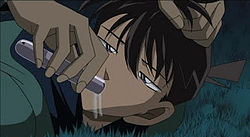 250px-APTX_4869_given_to_Shinichi.jpg